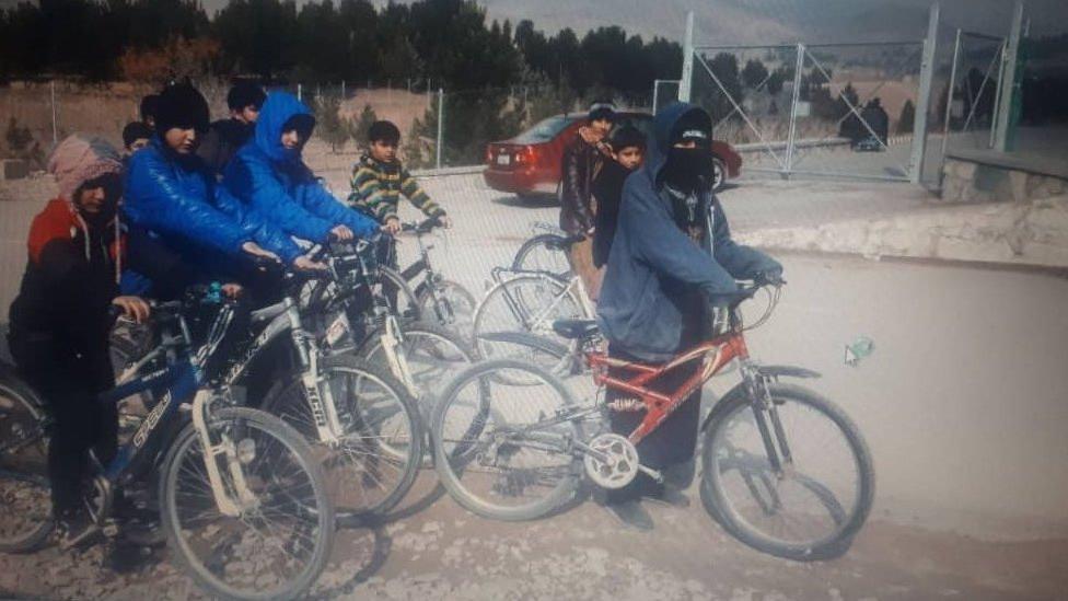 Afghan sports coach Sahba Barakzai flees as shots ring out after her dogs death.